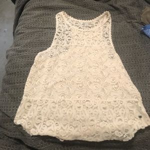 This is a white lace American Eagle tank top